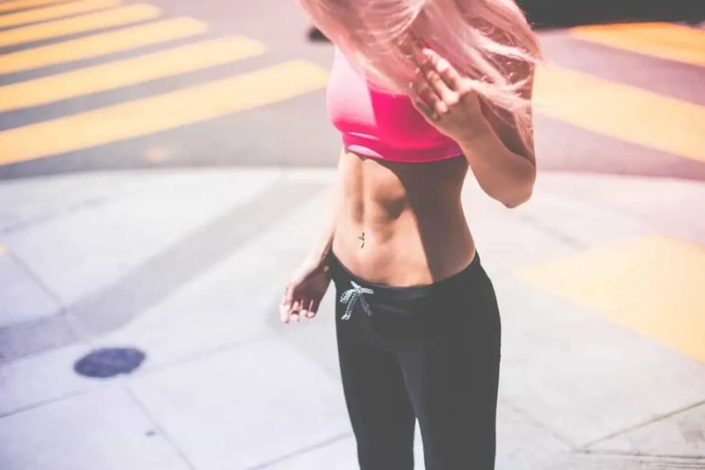 Woman with toned stomach after LA-EMS Body Sculpting Treatment Chelmsford